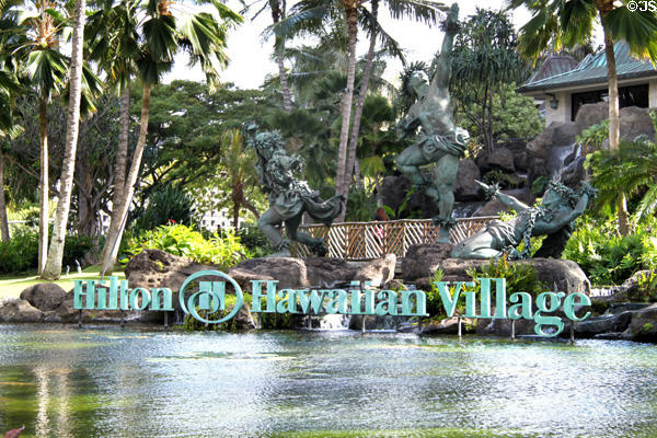 Entrance sculpture with Hawaiian folk lore hula dance at Hilton Hawaiian Village. Waikiki, HI.