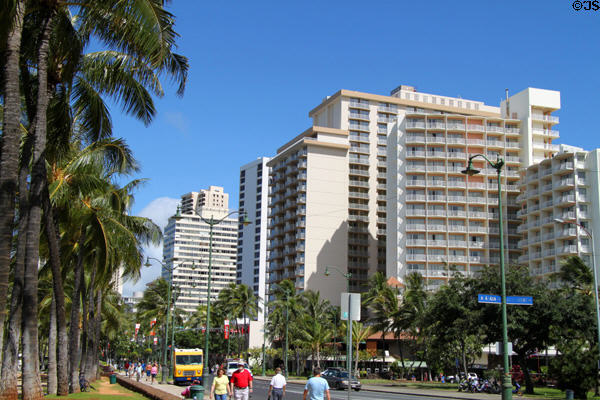 Kalakaua Ave. streetscape with Aston Waikiki Beach Hotel. Waikiki, HI.