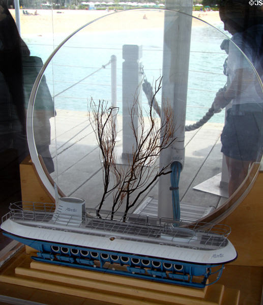 Model of Atlantis XIV submarine with sample of thick glass for viewports. Waikiki, HI.