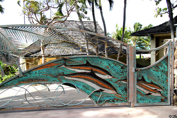 Artistic gate with dolphins for home east of Waikiki. Honolulu, HI.