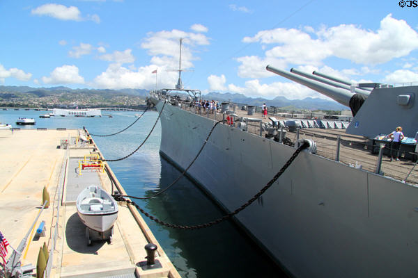 Bow of USS Missouri with Arizona Memorial in distance. Honolulu, HI.
