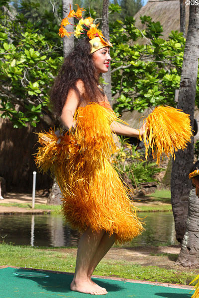 Tahitian dancer in Rainbows of Paradise show at Polynesian Cultural Center. Laie, HI.