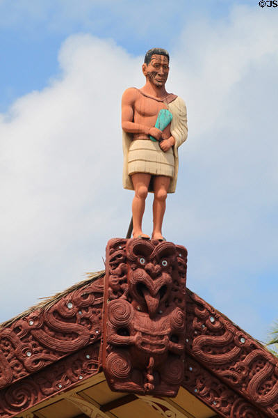 Carvings atop Aotearoa-Maori meeting house from New Zealand at Polynesian Cultural Center. Laie, HI.