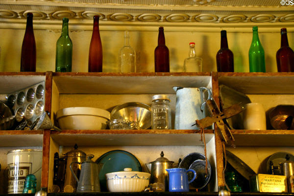 Antique bottles & utensils in High Amana Store. High Amana, IA.