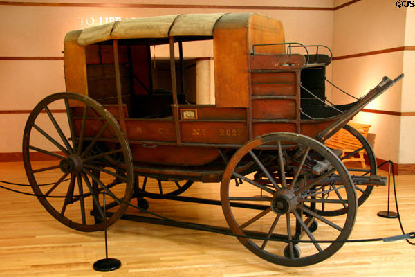 Stage coach (1850s) with leather strap suspension nicknamed Two Horse Jerky at Historical Museum of Iowa. Des Moines, IA.