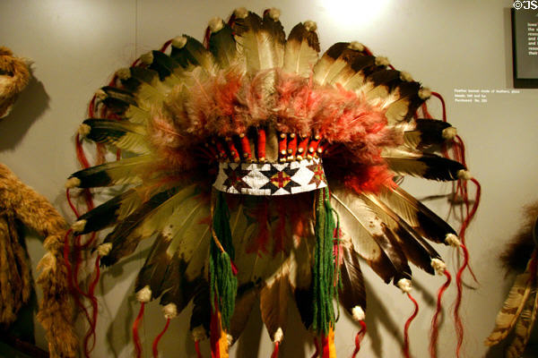 Native American feather headdress decorated with glass beads, felt & fur at Historical Museum of Iowa. Des Moines, IA.