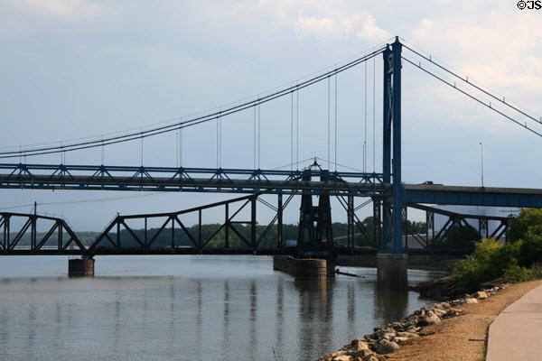 US 30 (Clinton Rd) suspension bridge & Union Pacific railroad swing bridge over Mississippi River. Clinton, IA.