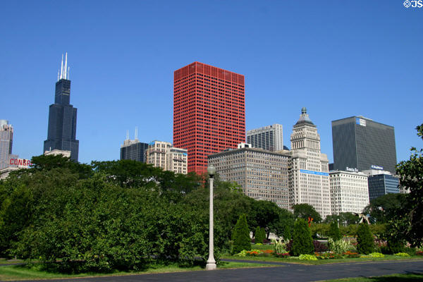 Black Sears Tower, red CNA Plaza, McCormick, Metropolitan, Santa Fe, & Park Monroe buildings over gardens of Grant Park. Chicago, IL.