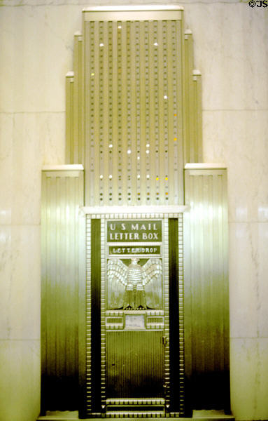 Art deco elevator lights in shape of skyscraper in lobby of Chicago Board of Trade building. Chicago, IL.