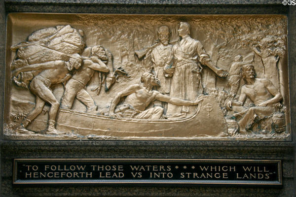 Bronze relief of Marquette & Jolliet exploring the Illinois wilderness with native Americans 