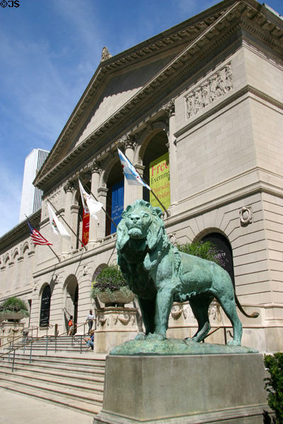 Lion sculpture stands before Art Institute of Chicago. Chicago, IL.