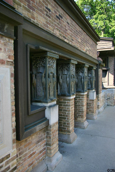F.L. Wright's studio entrance flanked by series of stork carvings. Oak Park, IL.