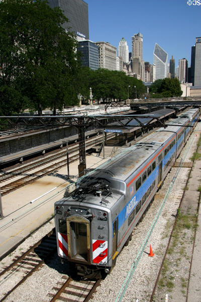 Metra commuter train passes through Van Buren Street station. Chicago, IL.