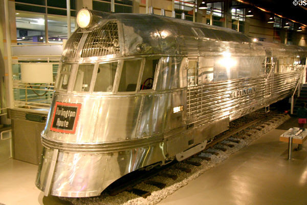 First diesel-electric streamlined train, named the Zephyr, was designed by Holabird & Root (exterior) + Paul Phillipe Cret (interior) & built (1934) for the Chicago Burlington & Quincy Railroad at Museum of Science & Industry. Chicago, IL.