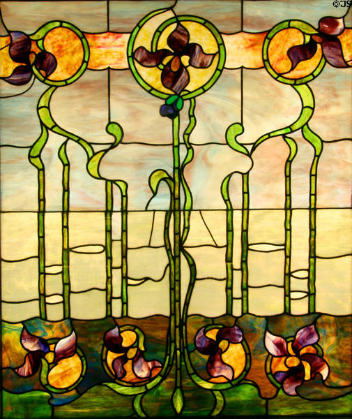 Stained glass window (c1900) with Art Nouveau Irises at Stained Glass Museum. Chicago, IL.