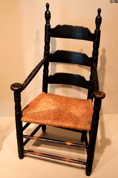 Wooden armchair with rush seat (1680-1710) from coastal CT or Long Island, NY at Art Institute of Chicago. Chicago, IL.