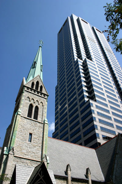 Bank One Tower (1990) above Christ Church Cathedral. Indianapolis, IN. Style: Postmodern. Architect: The Stubbins Associates, Inc..