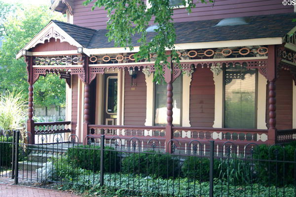 Home with elaborate turned-wood Eastlake porch (314 N. Park Ave.) in Lockerbie Square heritage area. Indianapolis, IN.