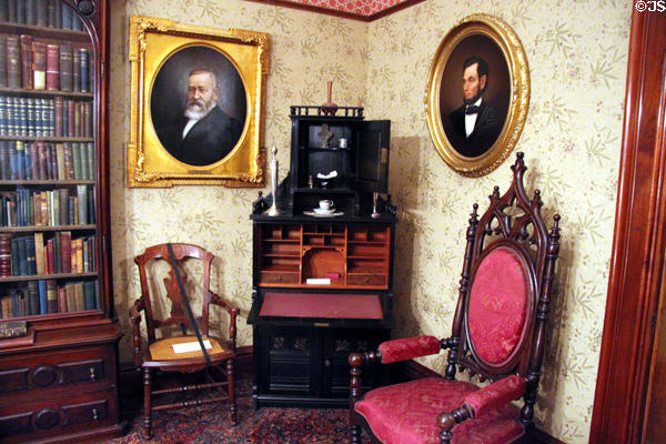 Fold down desk with portraits of Harrison & Lincoln in Library at Benjamin Harrison Presidential Site. Indianapolis, IN.