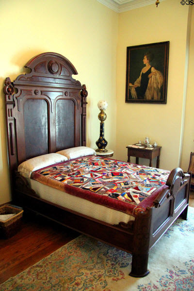 Elizabeth's bedroom with crazy quilt (1893) at Benjamin Harrison Presidential Site. Indianapolis, IN.