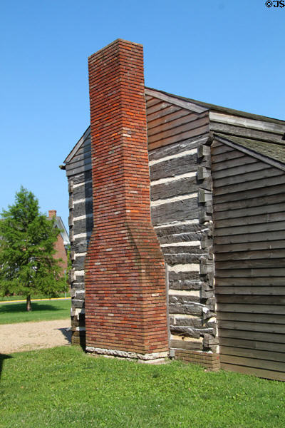Brick chimney on log cabin visitor center. Vincennes, IN.