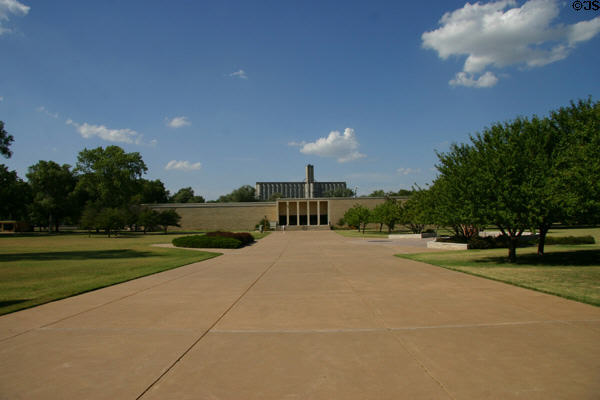 Dwight D. Eisenhower Presidential Museum (1954) building set against Abilene grain elevator. Abilene, KS.