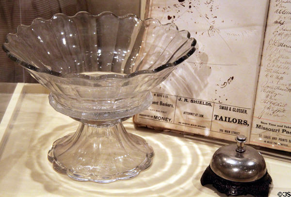 Pressed glass punch bowl (1873) & hotel desk bell at Sedgwick County Historical Museum. Wichita, KS.