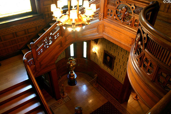 Main stair hall in Conrad-Caldwell House is elaborately carved wood. Louisville, KY.