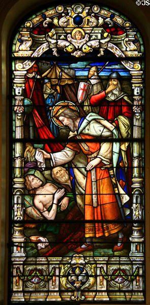 King Louis IX ministers to lepers by German stained glass Oidtmann studios (1929) in St Louis Cathedral. New Orleans, LA.