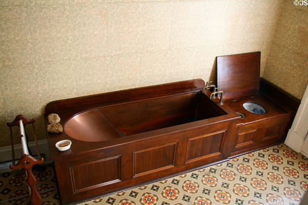 Bathtub & commode ahead of its time at Gallier House. New Orleans, LA.