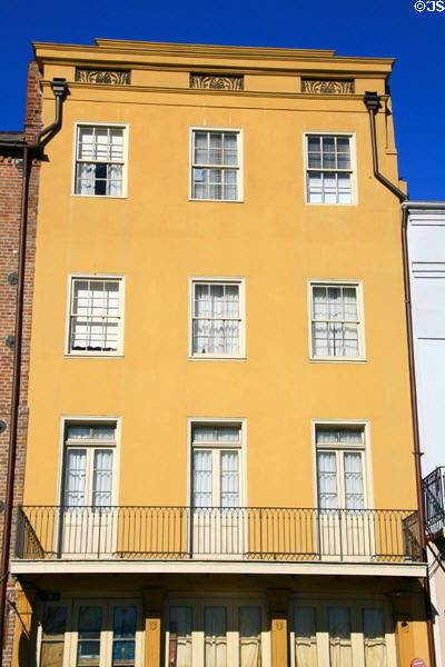 Heritage yellow building on Decatur St. near St. Louis St. New Orleans, LA.