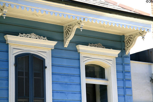 Details of brackets on blue shotgun house (1233 Bourbon St.). New Orleans, LA.