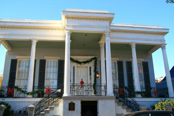 Xiques House (1852) (521 Dauphine St.) was Spanish Consulate (1871-77) with southern double staircase. New Orleans, LA. Style: Greek Revival.