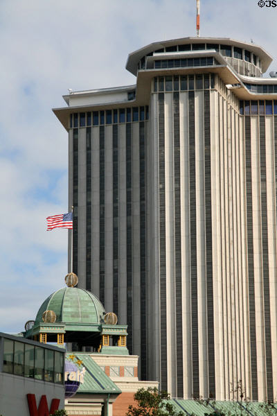 Observation crown of World Trade Center New Orleans over domes of Harrah's Casino. New Orleans, LA.