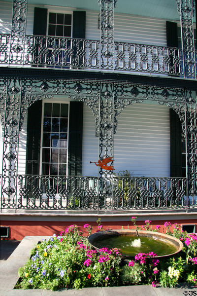 Ironwork side veranda facing 1st St. of 2403 Camp St. in Garden District. New Orleans, LA.