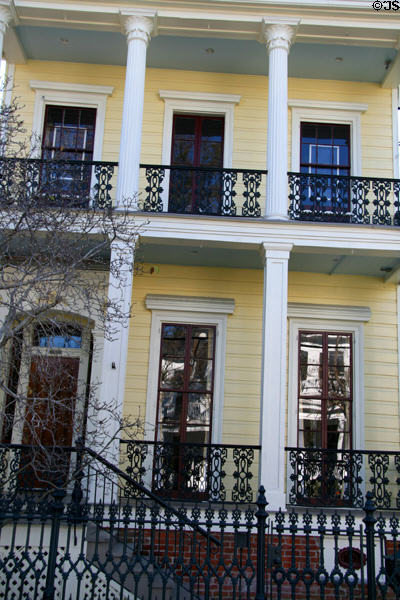 Yellow Freret folley house (2700 Coliseum St.) in Garden District. New Orleans, LA. Architect: William A. Freret.