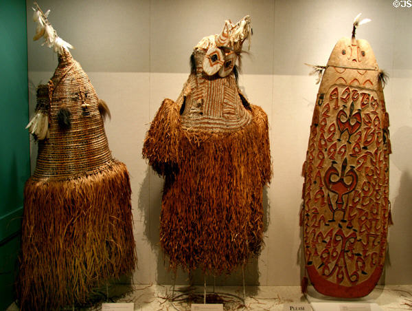 Asmat body masks & shield (1990s) from Papua, Indonesia, at New Orleans Museum of Art. New Orleans, LA.