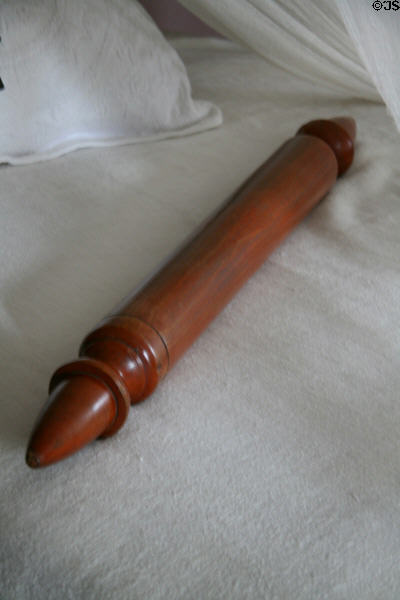 Antique rolling pin for smoothing moss filled mattress bedding at Oak Alley Plantation. Vacherie, LA.