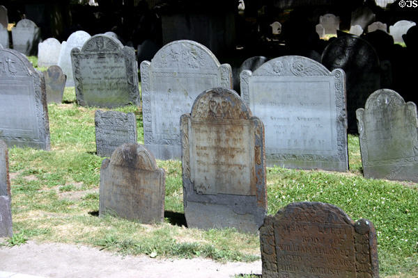 Tombstones with death heads in King's Chapel Burying Ground. Boston, MA.