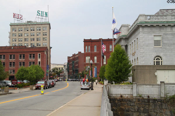 View up Merrimack St. to Sun Building (1913). Lowell, MA.