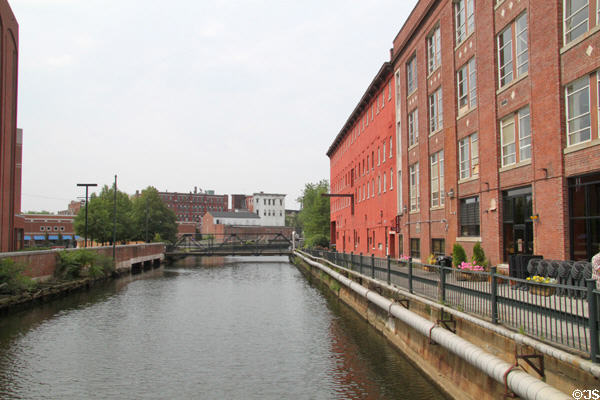 Canal with restored factory buildings in Lowell. Lowell, MA.