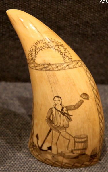 Scrimshaw figure of sailor with anchor at New Bedford Whaling Museum. New Bedford, MA.