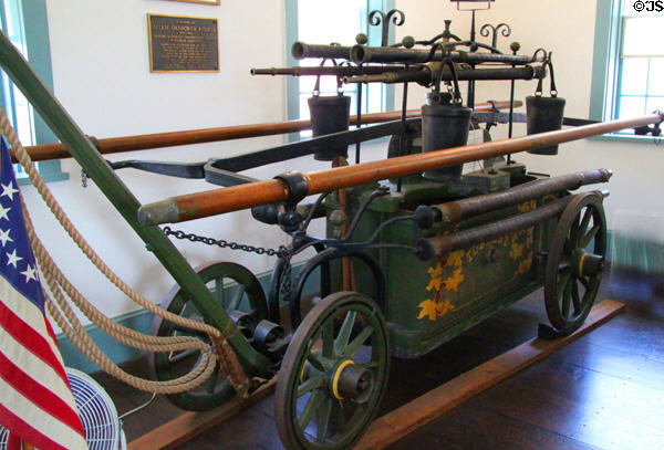 Hand-drawn suction pumper fire engine (1828) by Stephen Thayer of Boston at 1749 Court House Museum. Plymouth, MA.