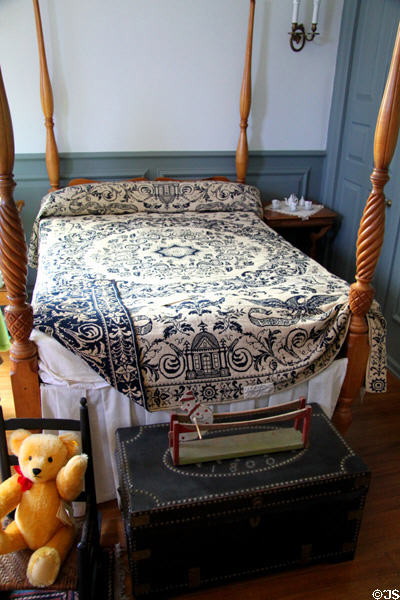 Four-poster bed with quilt at Mayflower Society House. Plymouth, MA.