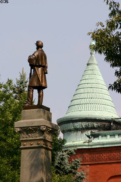 Victorian Romanesque building's cone shaped tower & Springfield's Civil War monument. Springfield, MA.