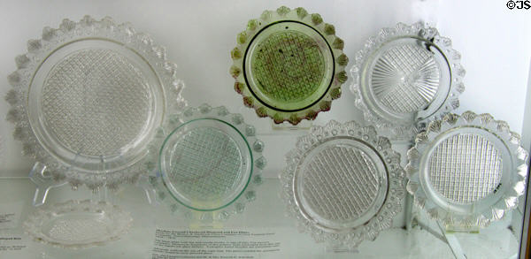 Machine pressed checkered diamond & fan plates (1828-30) by Boston & Sandwich Glass Co. or New England Glass Co. at Sandwich Glass Museum. Sandwich, MA.