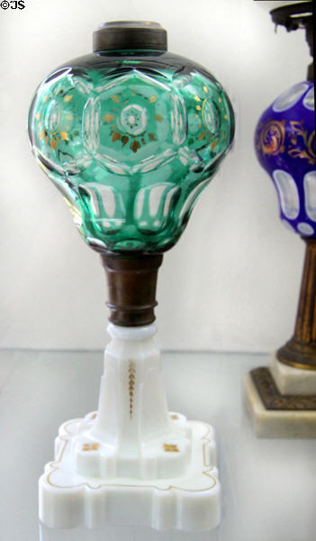 Cut overlay glass lamp in Washington cut pattern with pressed base (c1860-87) by Boston & Sandwich Glass Co. at Sandwich Glass Museum. Sandwich, MA.