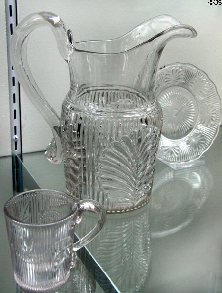Pressed ribbed palm glass pieces (1863-73) by Boston & Sandwich Glass Co. or McKee & Brother of Pittsburgh at Sandwich Glass Museum. Sandwich, MA.