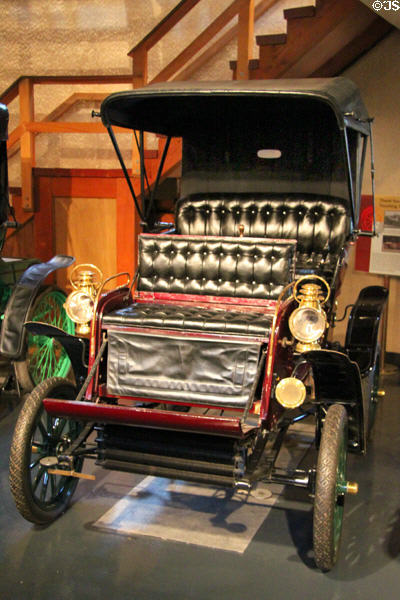 Stevens-Duryea motorcar (1903) where driver sits in back seat from Chicopee Falls, MA at Heritage Plantation Auto Museum. Sandwich, MA.