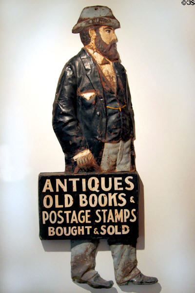 Book & stamp salesman tin advertising sign (c1890) at Heritage Plantation. Sandwich, MA.